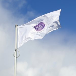 Jubilee flag flying against blue sky