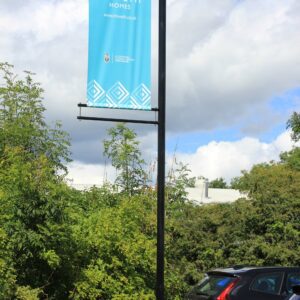 Black steel banner pole with blue banner